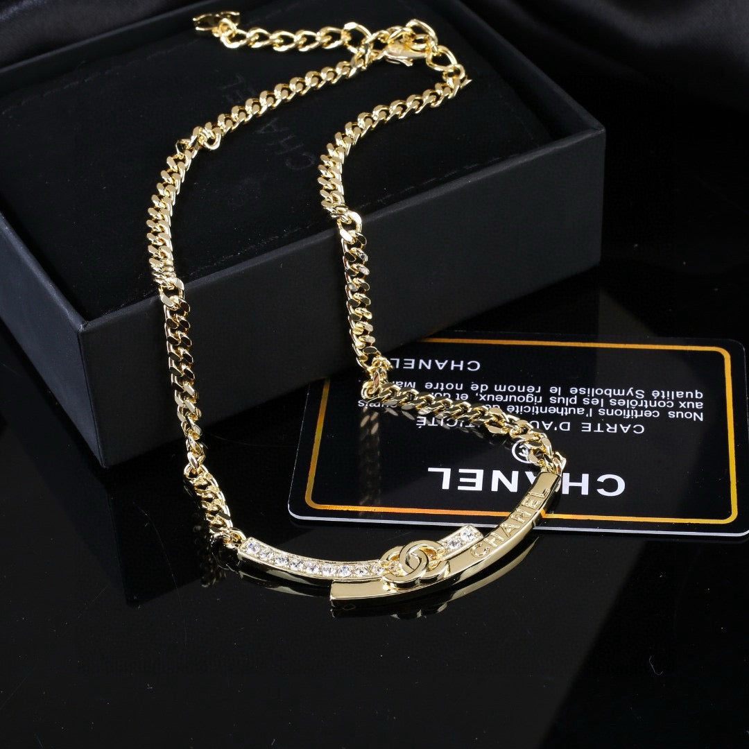 Martin Graham pendant necklace in polished metal-tone – front product view
