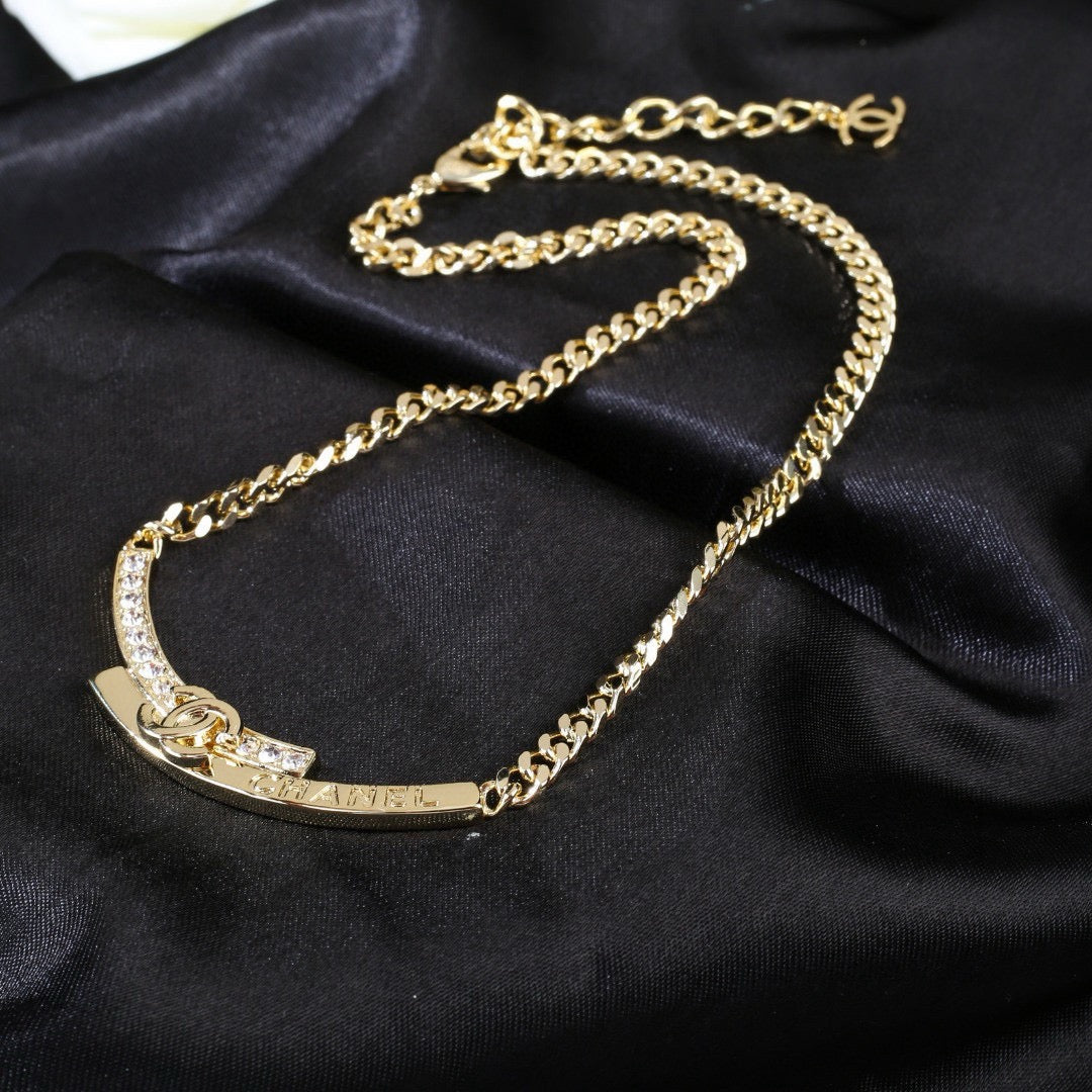 Martin Graham pendant necklace in polished metal-tone – styled product view
