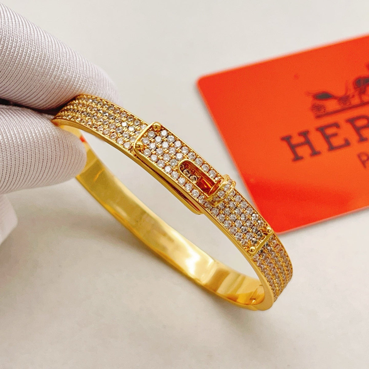 Martin Graham bangle in polished metal-tone – side detail