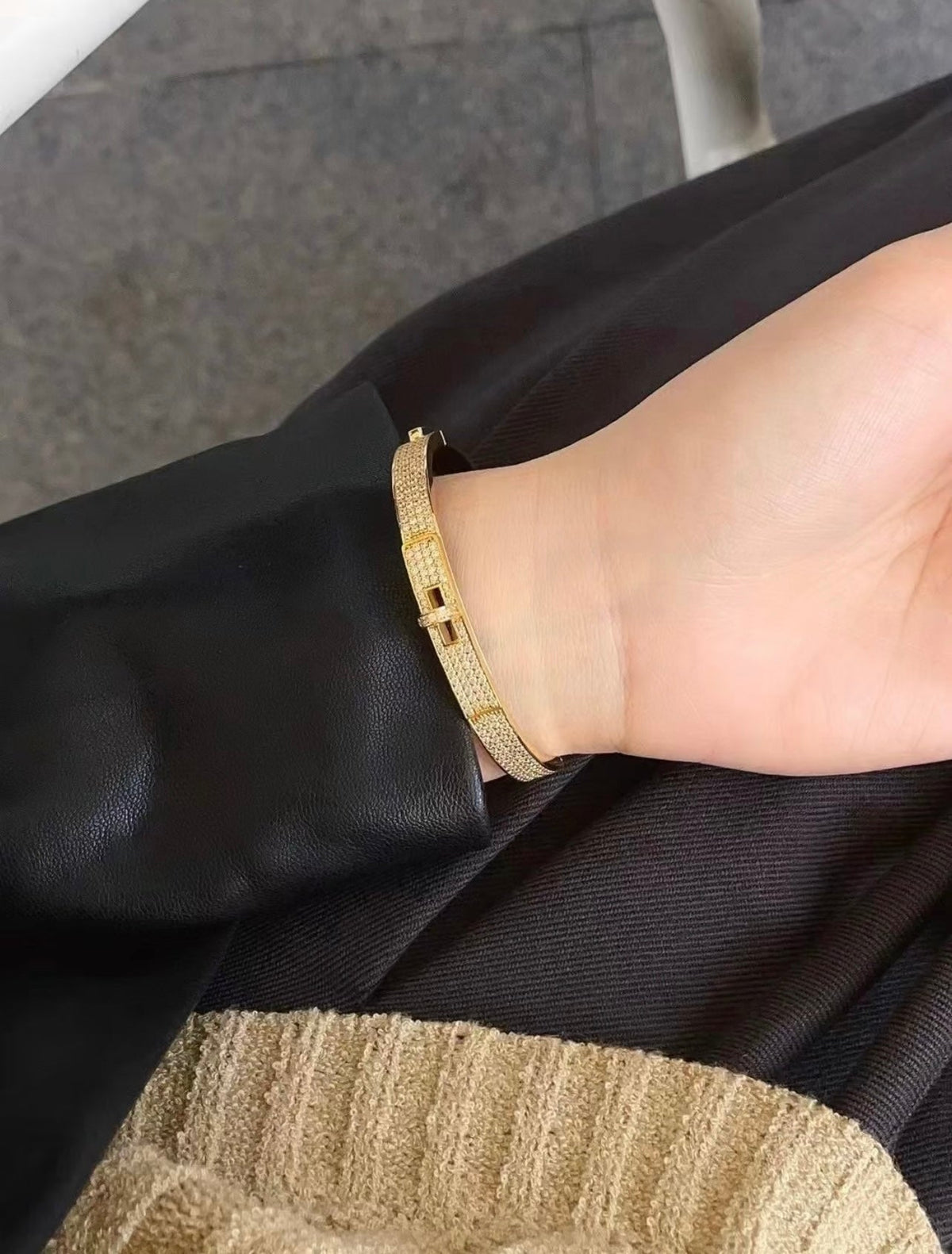 Martin Graham bangle in polished metal-tone – close-up detail