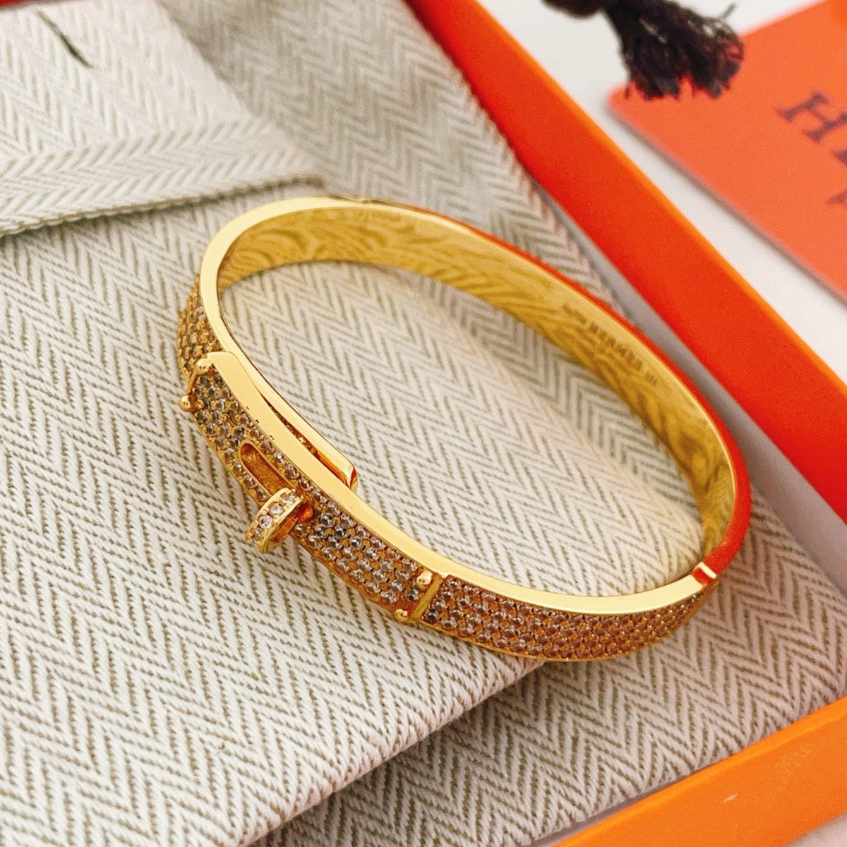 Martin Graham bangle in polished metal-tone – close-up detail