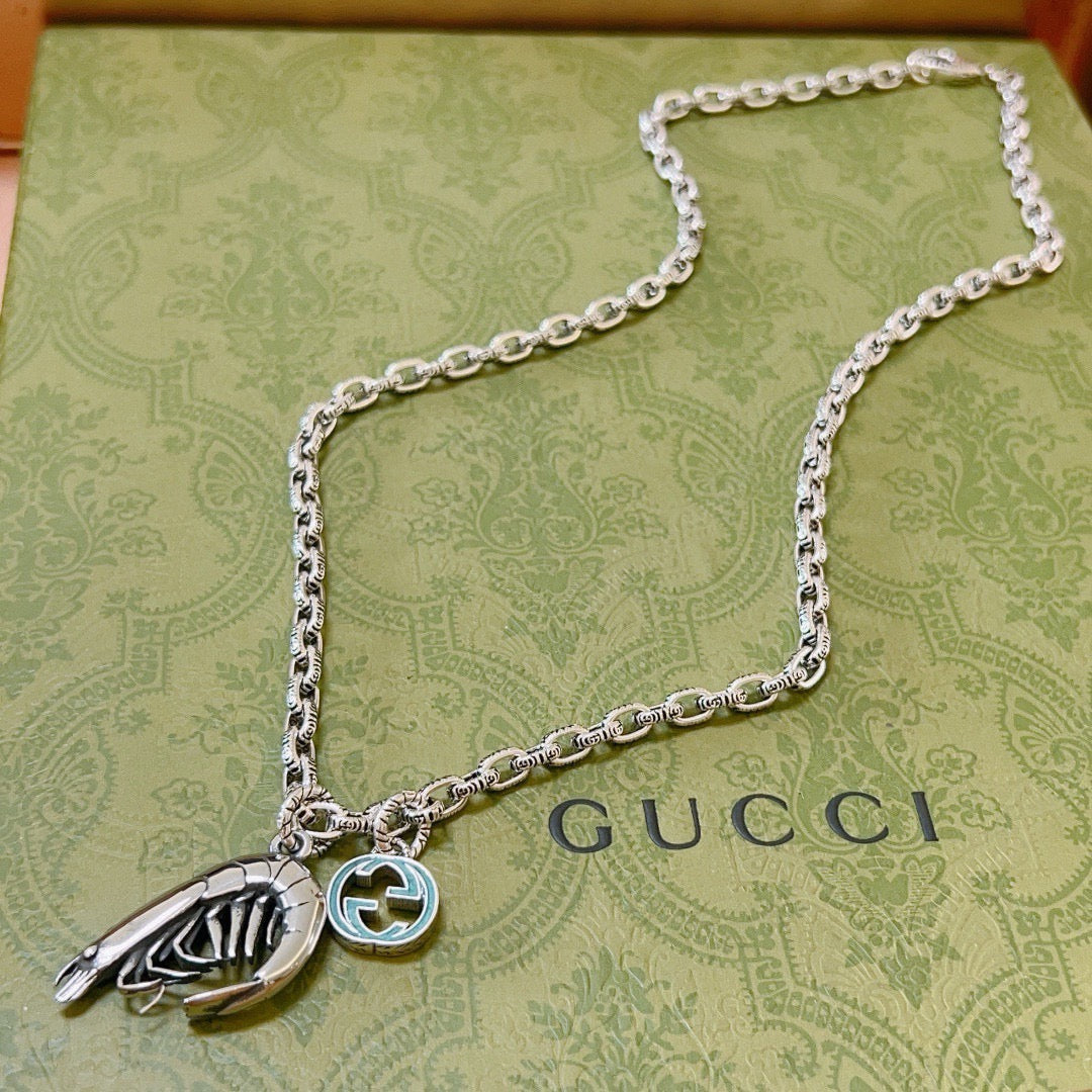 Martin Graham pendant necklace in polished metal-tone – detail view