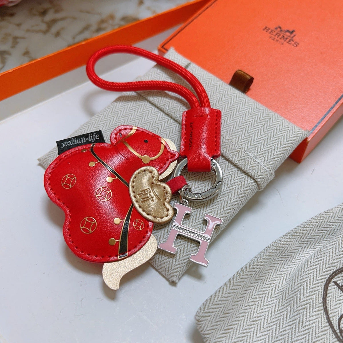 Martin Graham keychain in polished metal-tone – styled product view