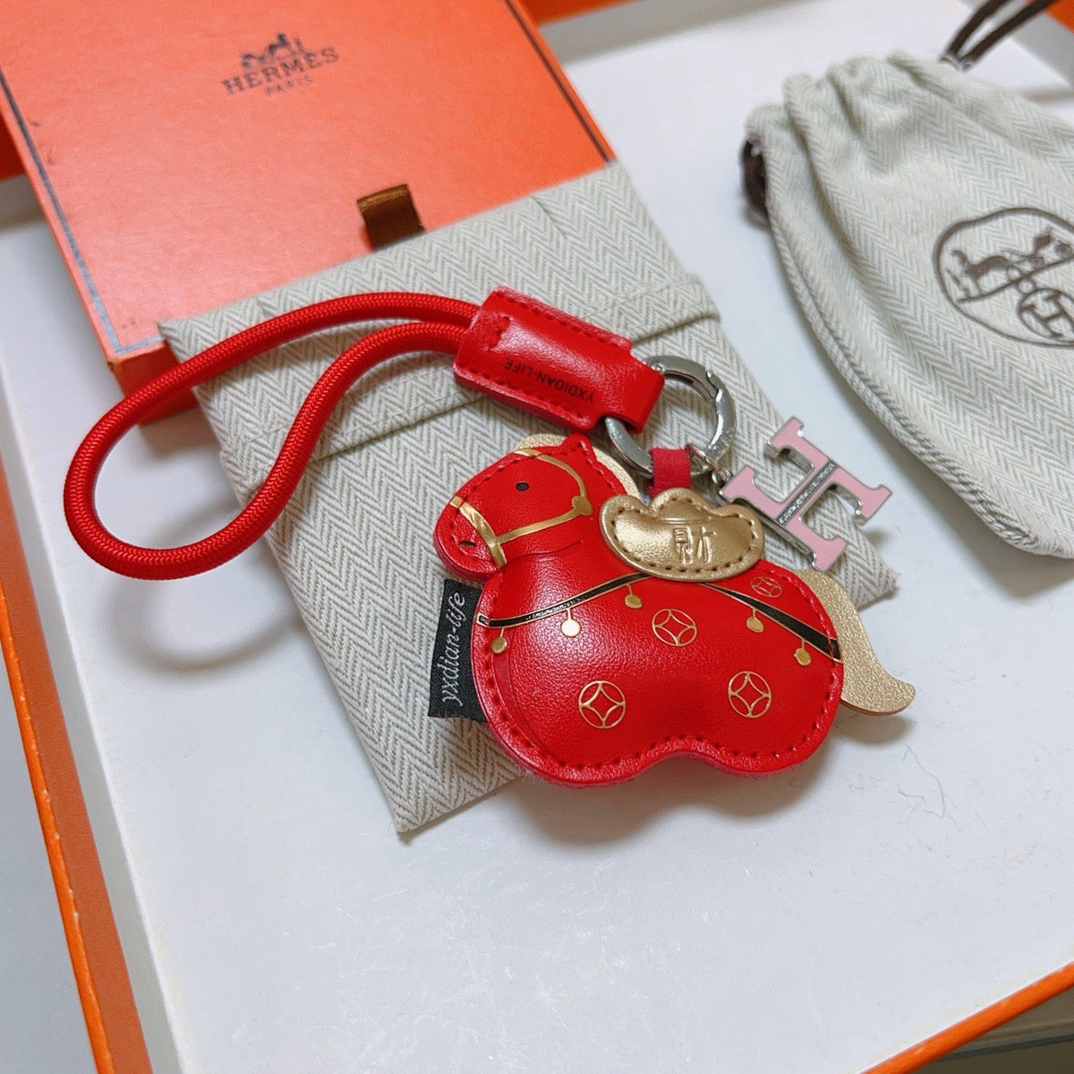 Martin Graham keychain in polished metal-tone – front product view
