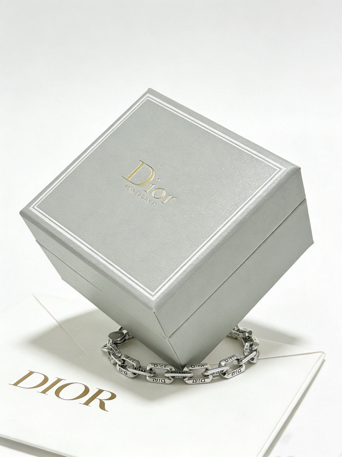 Martin Graham pendant necklace in polished metal-tone – front view