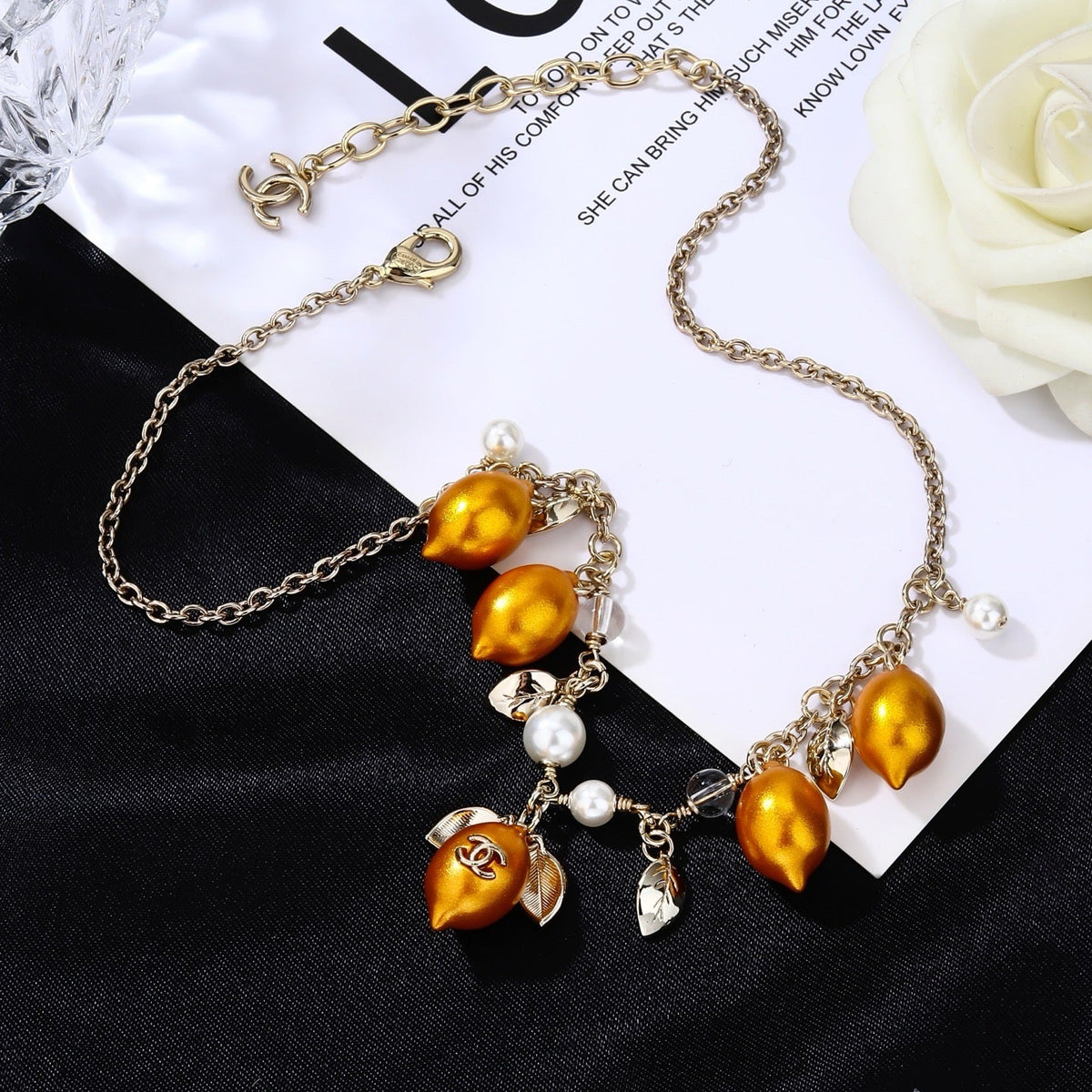 Martin Graham pendant necklace in polished metal-tone – close-up detail