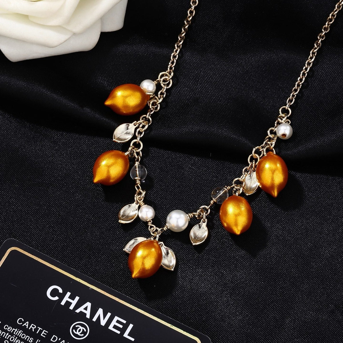 Martin Graham pendant necklace in polished metal-tone – detail view