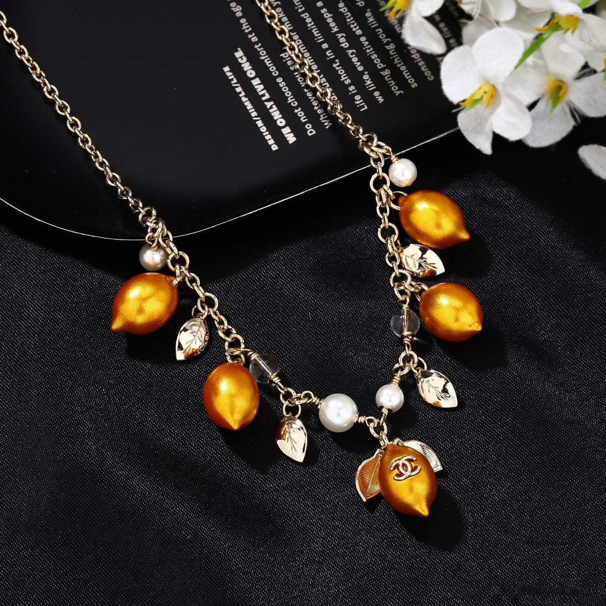 Martin Graham pendant necklace in polished metal-tone – side detail