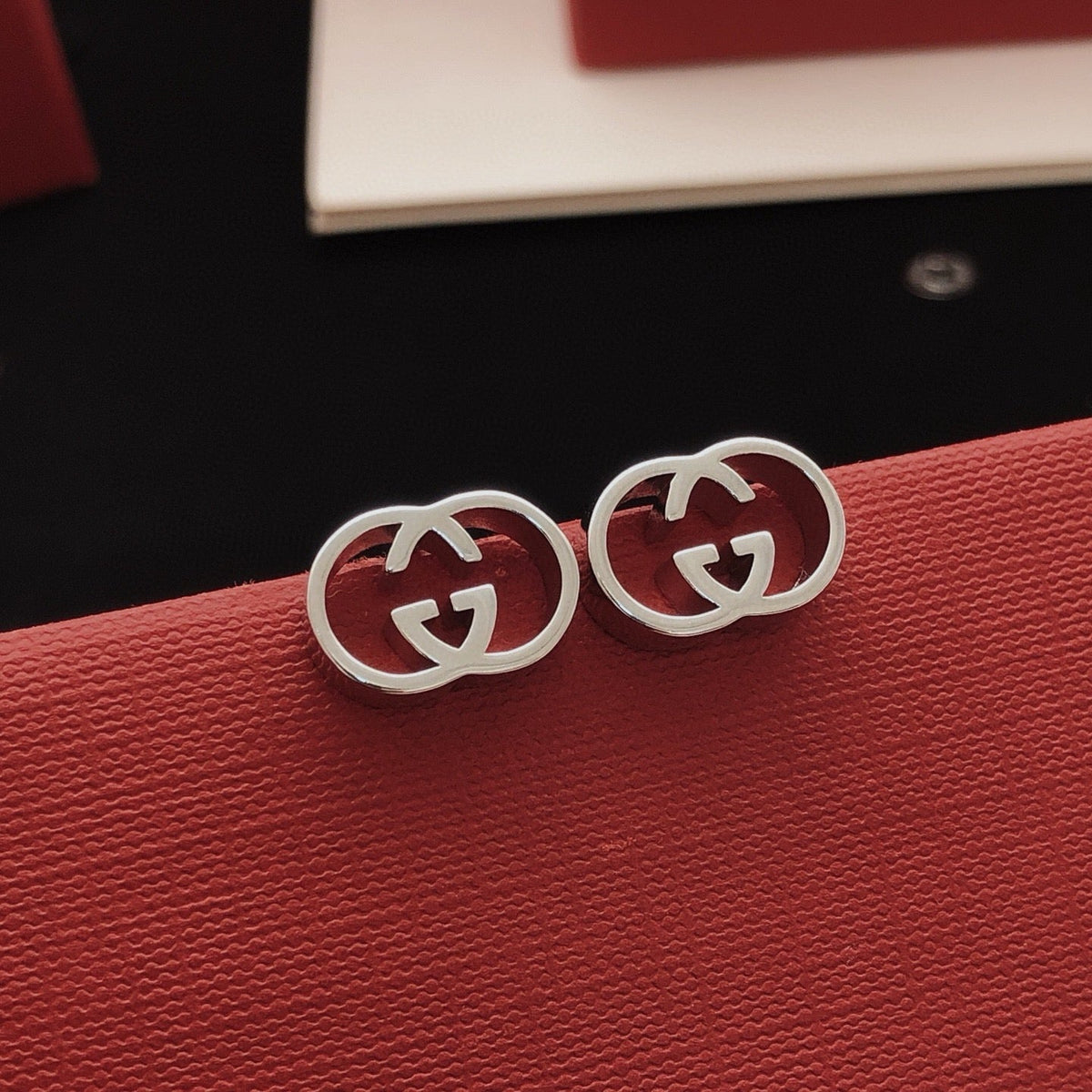 Martin Graham stud earrings in polished metal-tone – main product view