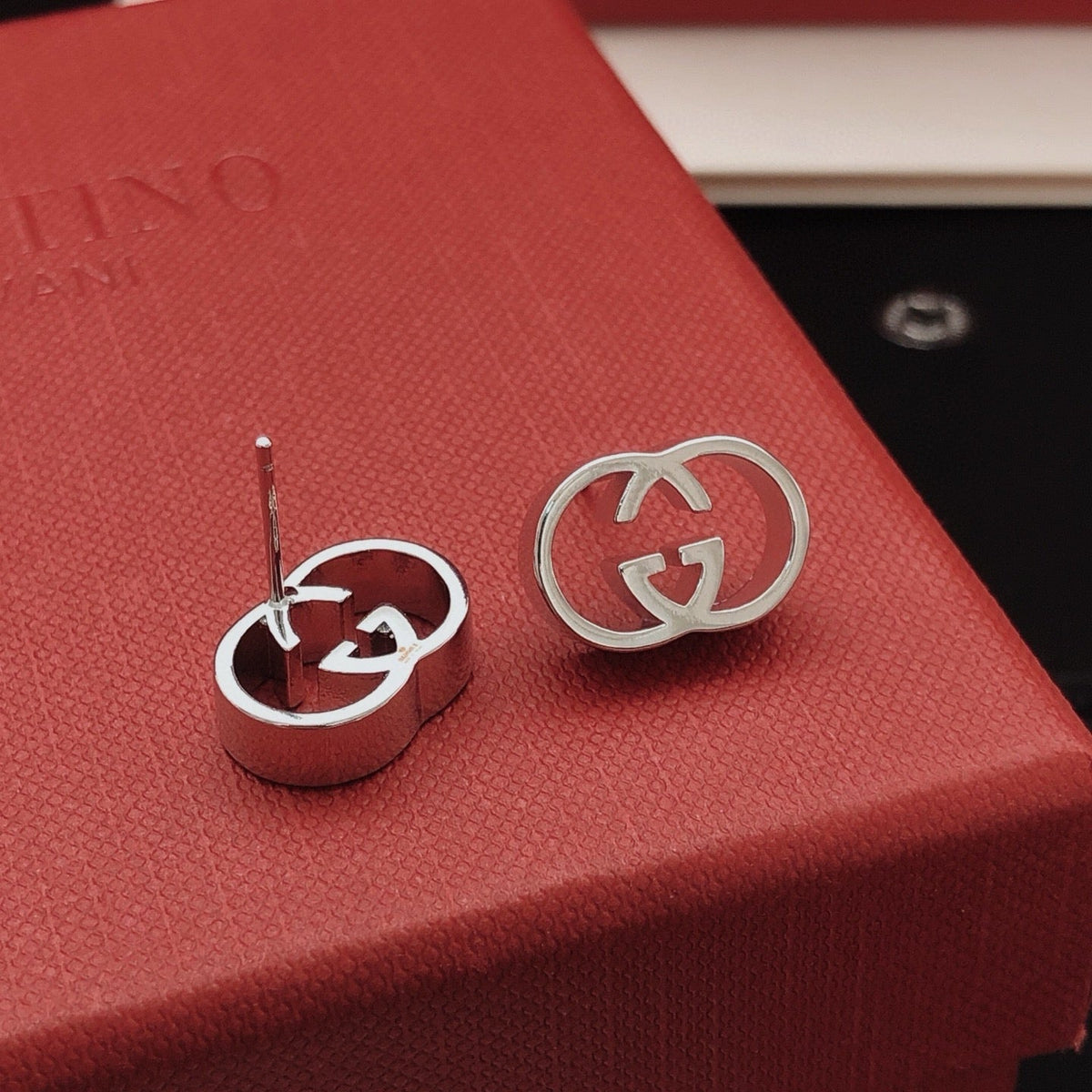 Martin Graham stud earrings in polished metal-tone – main product view