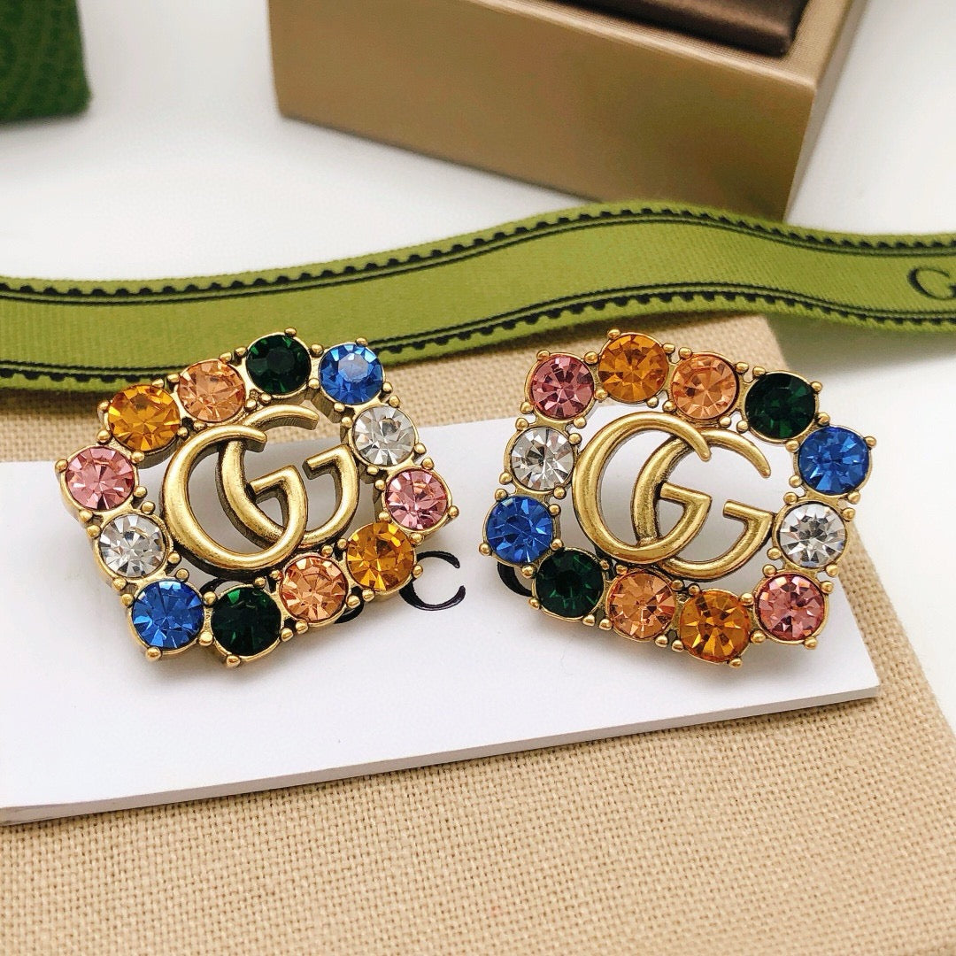 Martin Graham stud earrings in polished metal-tone – main product view