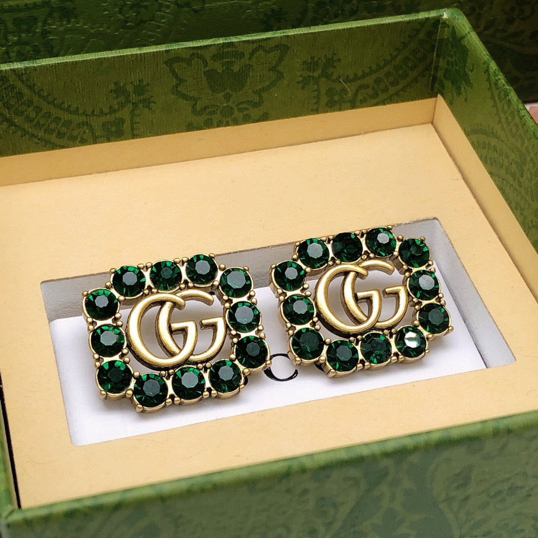Martin Graham stud earrings in polished metal-tone – main product view