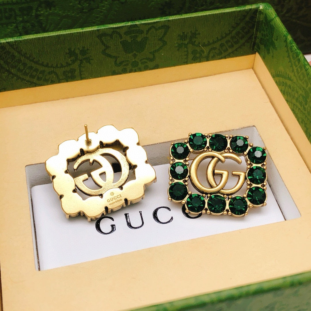 Martin Graham stud earrings in polished metal-tone – styled product view
