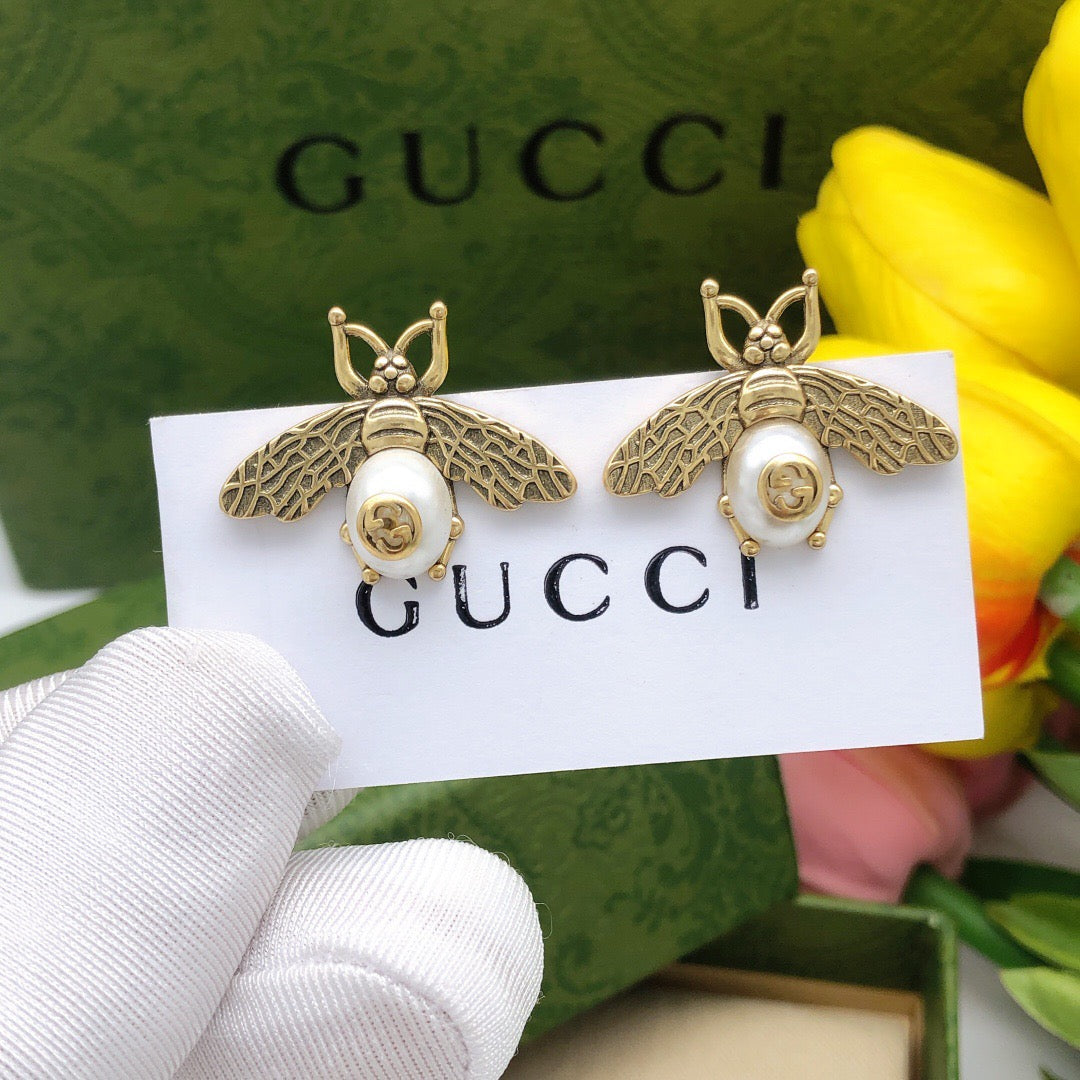 Martin Graham stud earrings in polished metal-tone – main product view