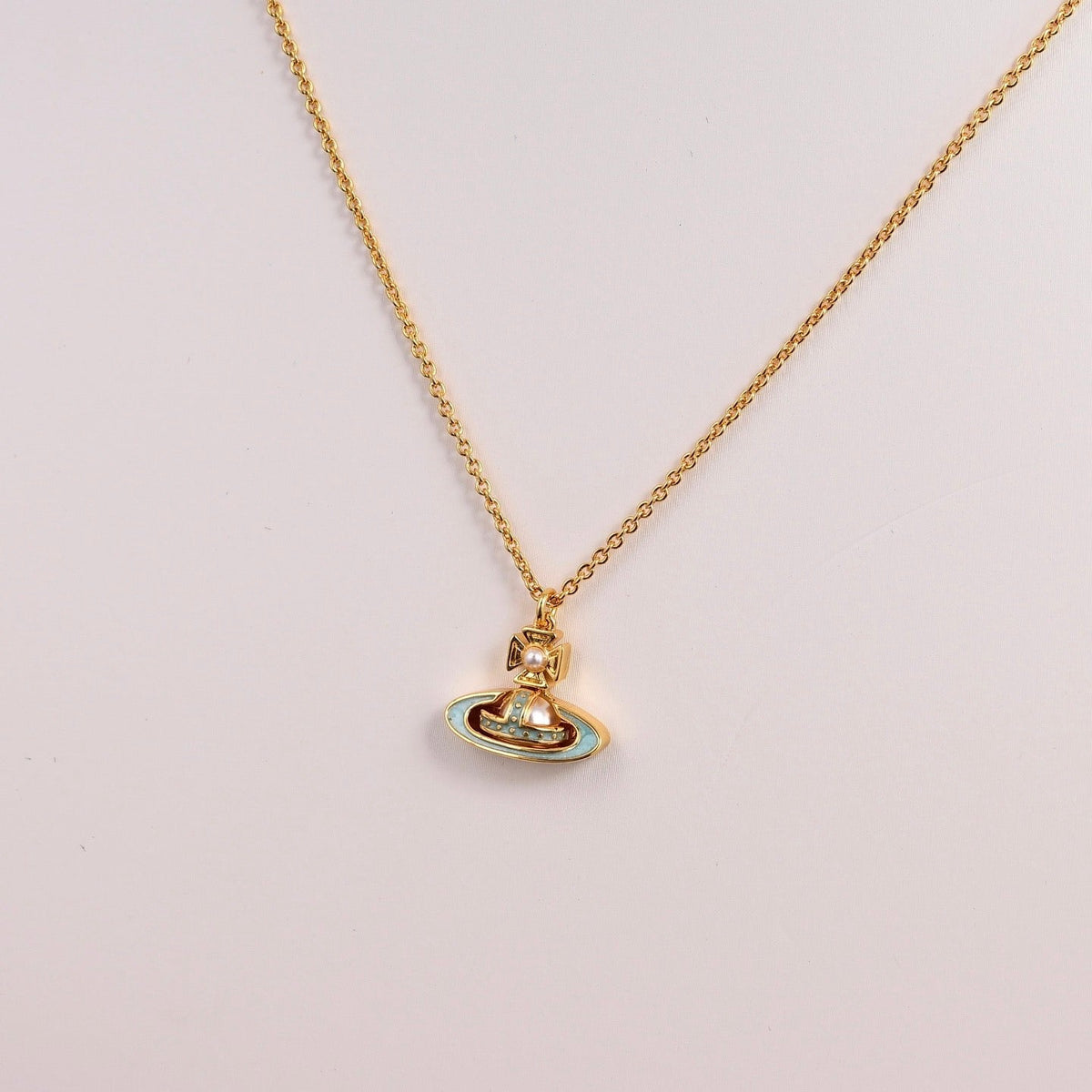 Martin Graham pendant necklace in polished metal-tone – detail view