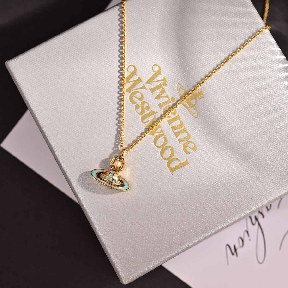 Martin Graham pendant necklace in polished metal-tone – main product view