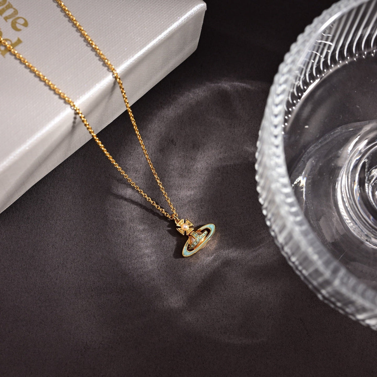 Martin Graham pendant necklace in polished metal-tone – close-up detail
