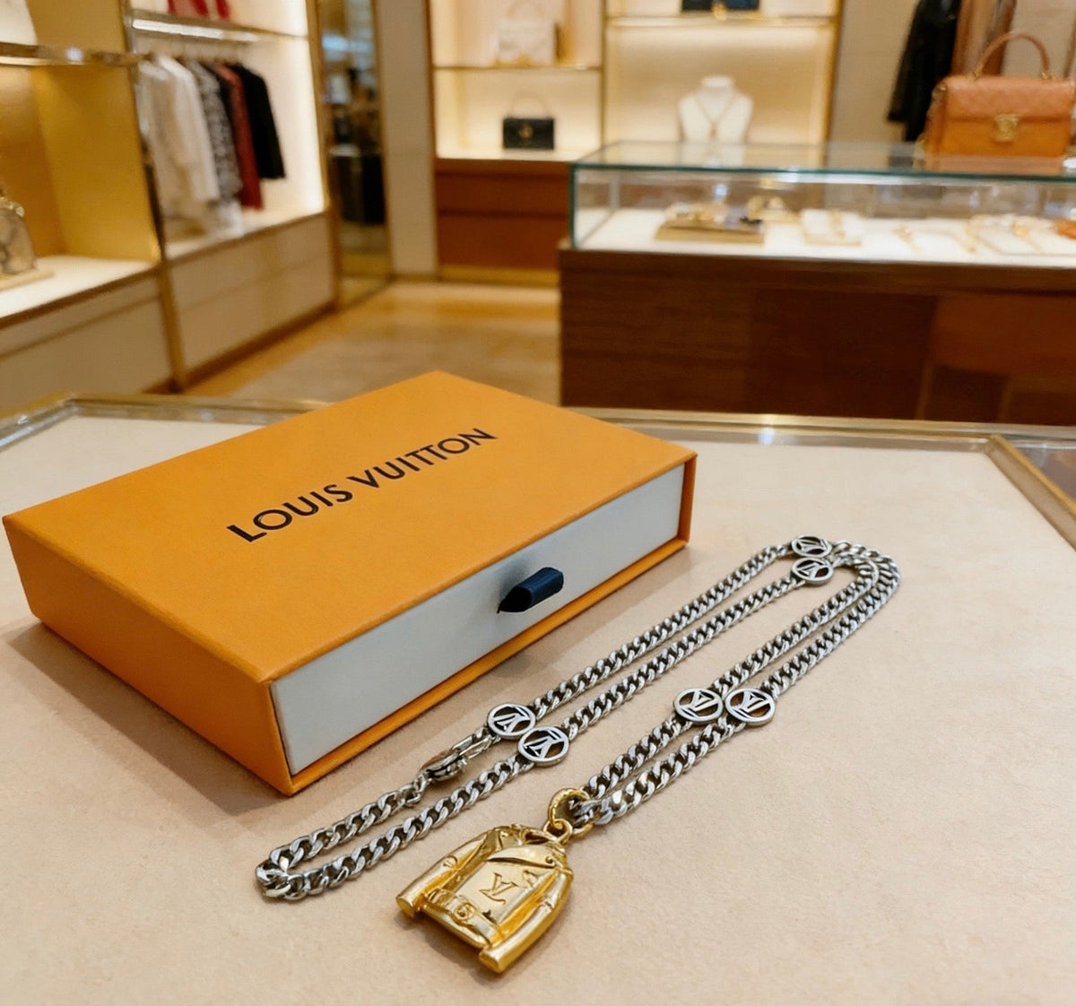 Martin Graham pendant necklace in polished metal-tone – detail view