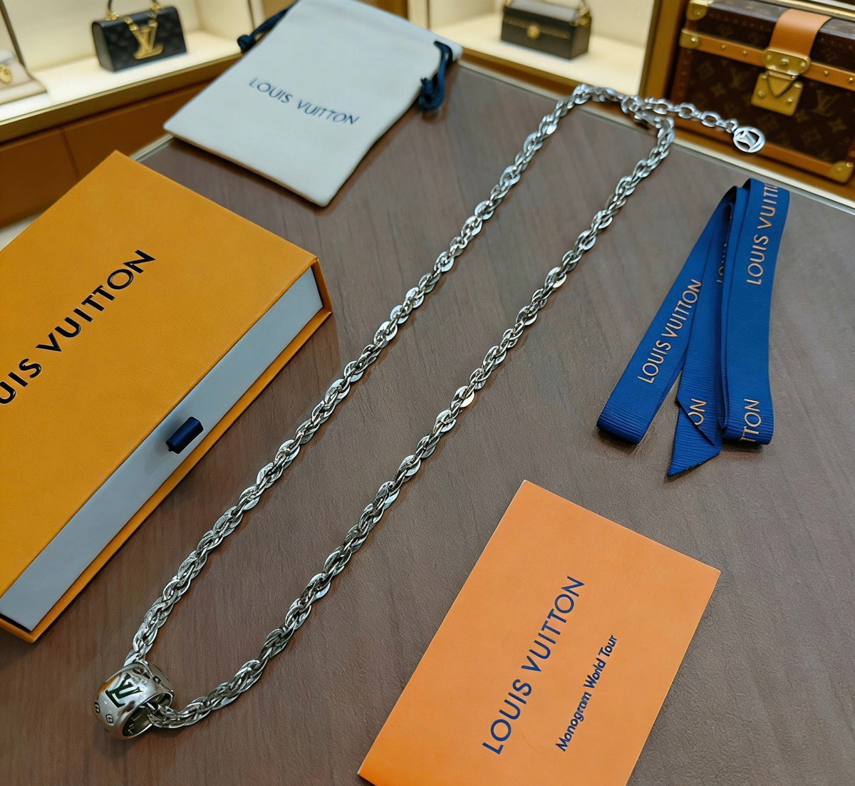 Martin Graham pendant necklace in polished metal-tone – detail view
