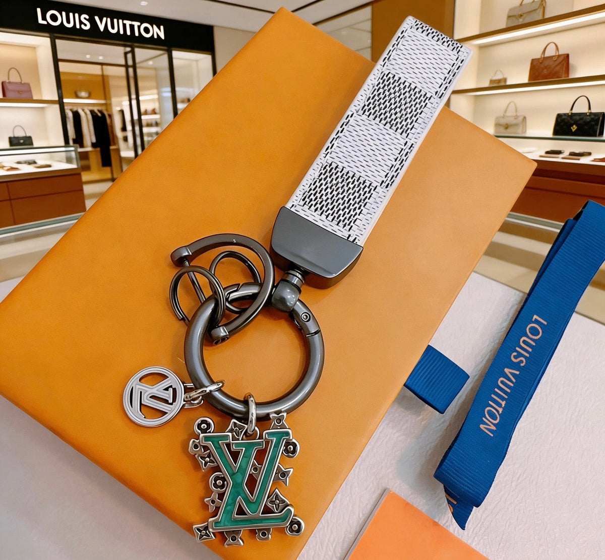 Martin Graham keychain in polished metal-tone – detail view