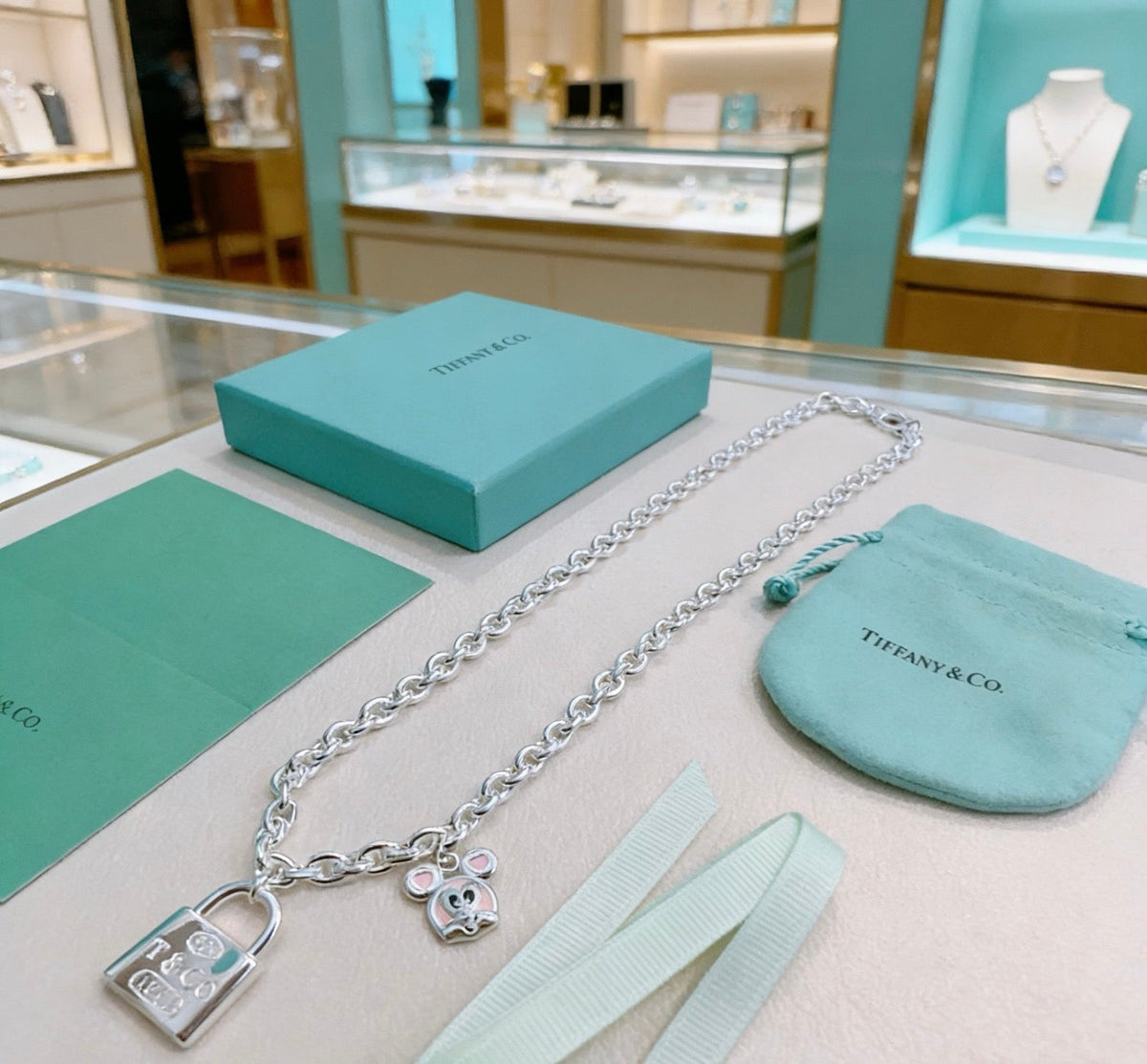 Martin Graham pendant necklace in polished metal-tone – front product view