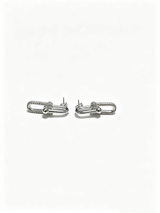 Martin Graham stud earrings in polished metal-tone – main product view