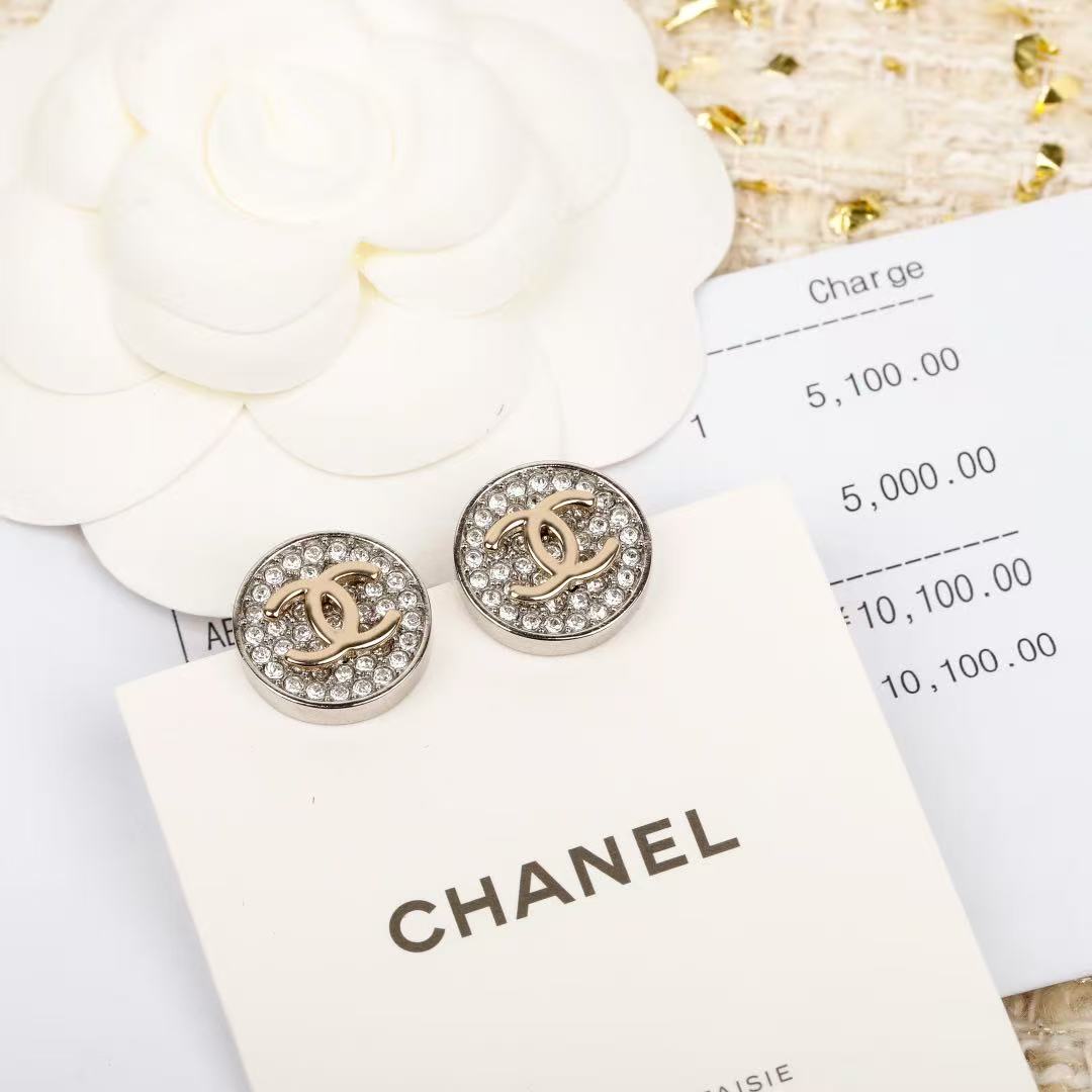 Martin Graham stud earrings in polished metal-tone – detail view