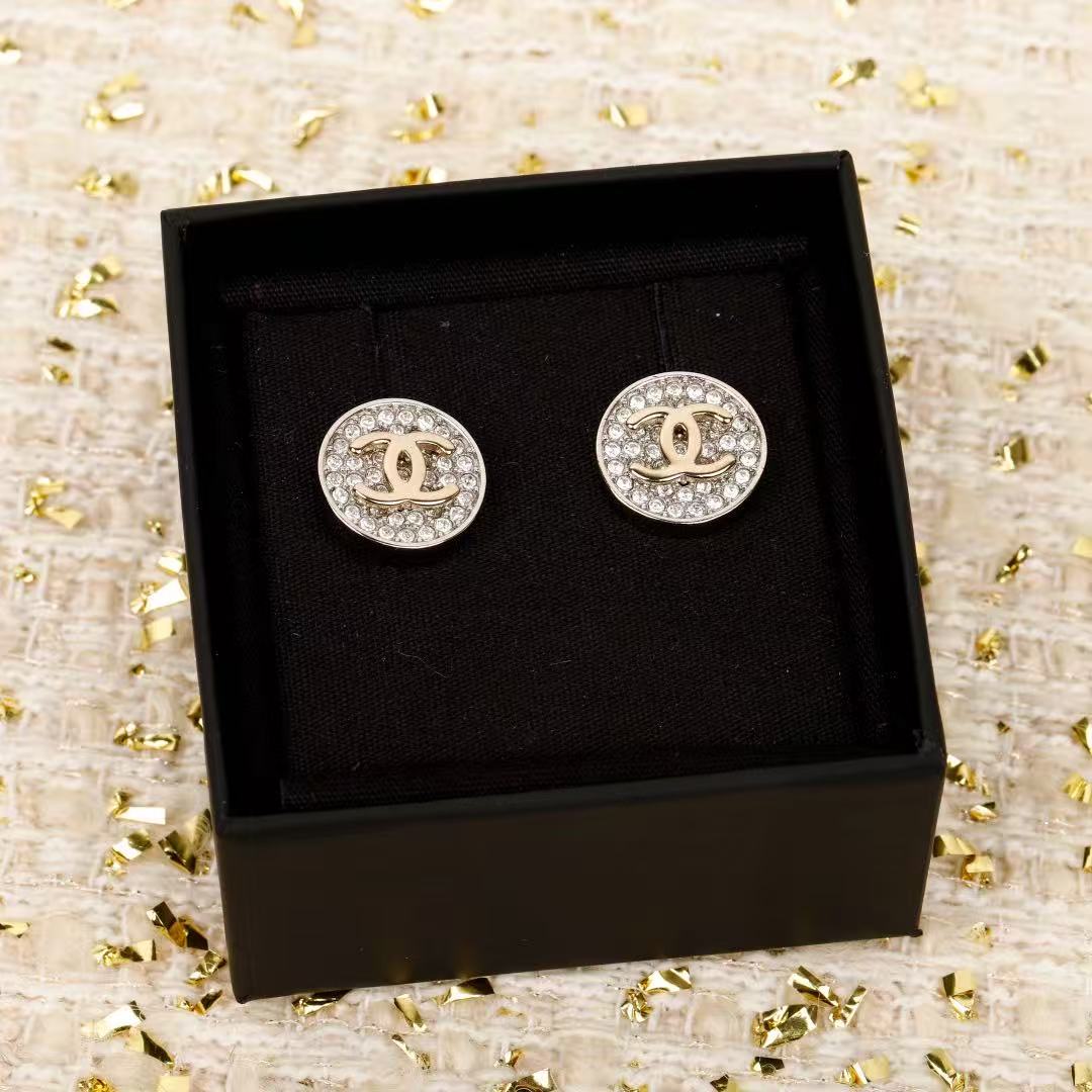Martin Graham stud earrings in polished metal-tone – side detail
