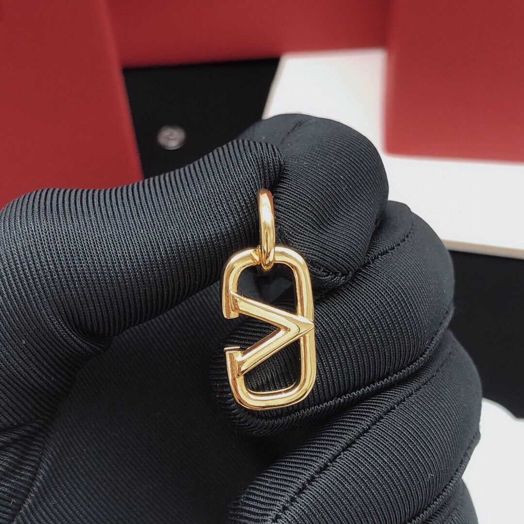 Martin Graham drop earrings in polished metal-tone – front view