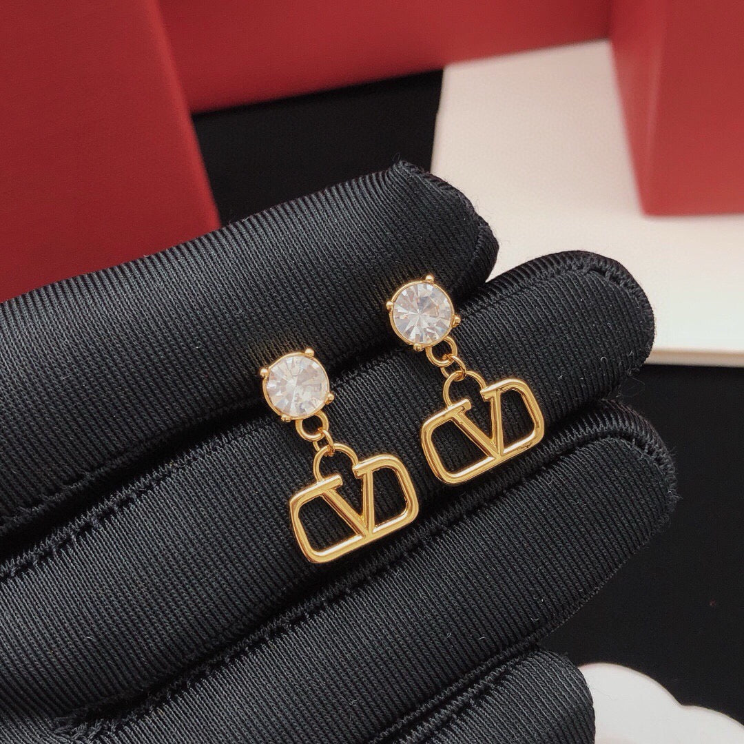 Martin Graham stud earrings in polished metal-tone – main product view