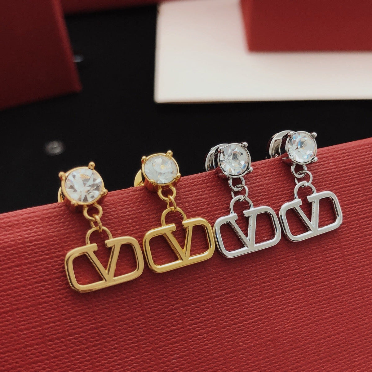 Martin Graham stud earrings in polished metal-tone
