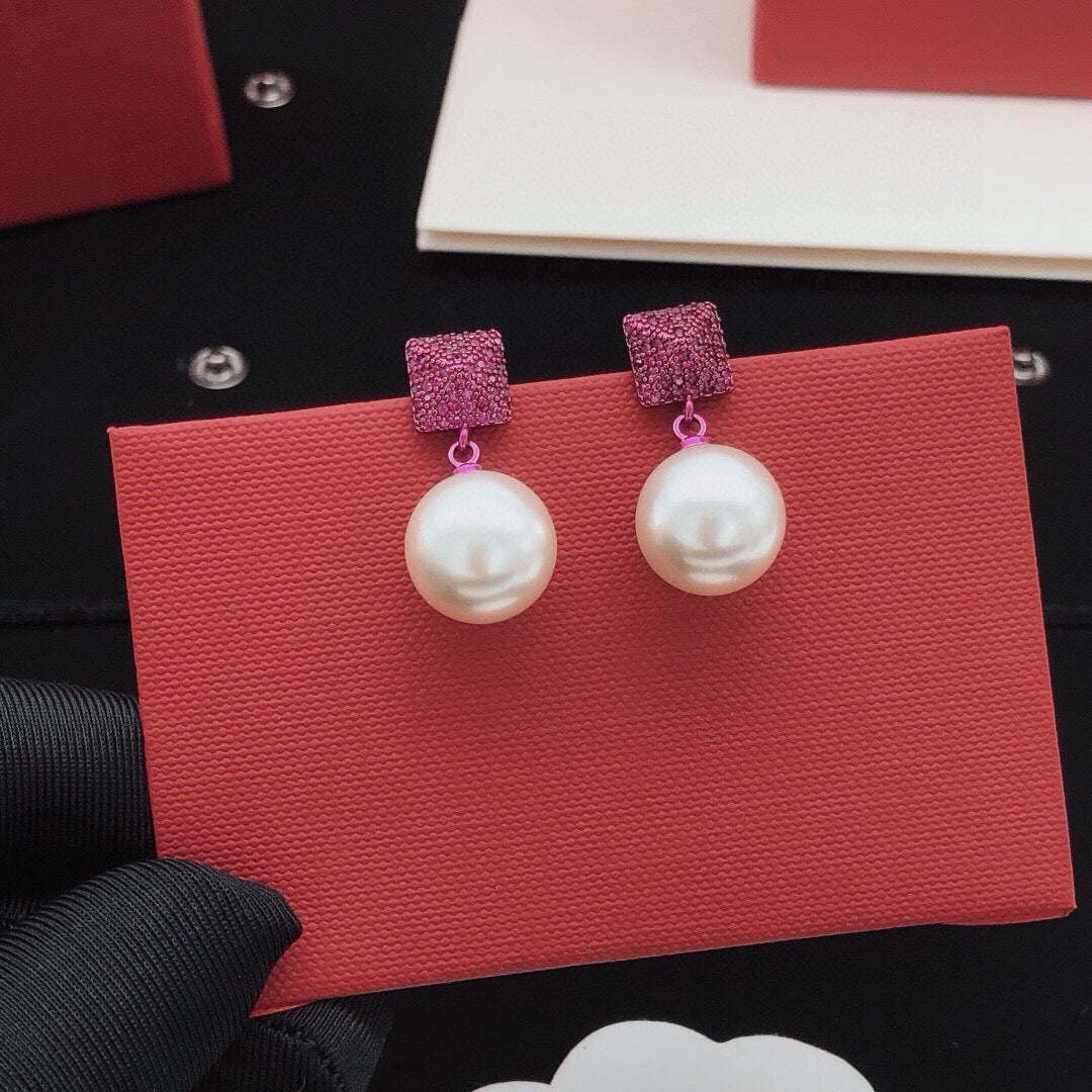 Martin Graham stud earrings in polished metal-tone – main product view