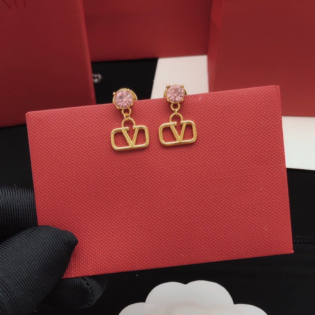 Martin Graham stud earrings in polished metal-tone – detail view