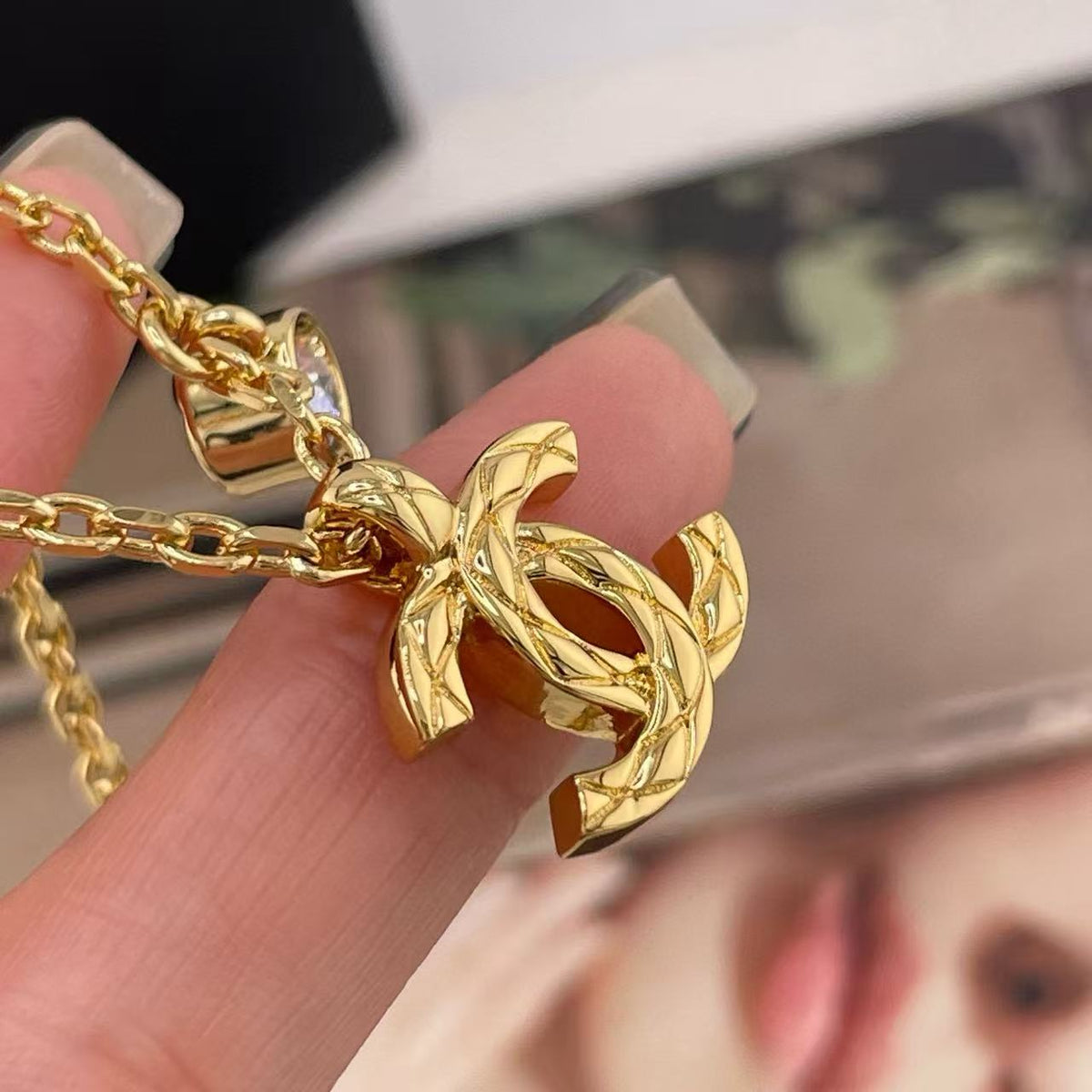 Martin Graham pendant necklace in polished metal-tone – detail view