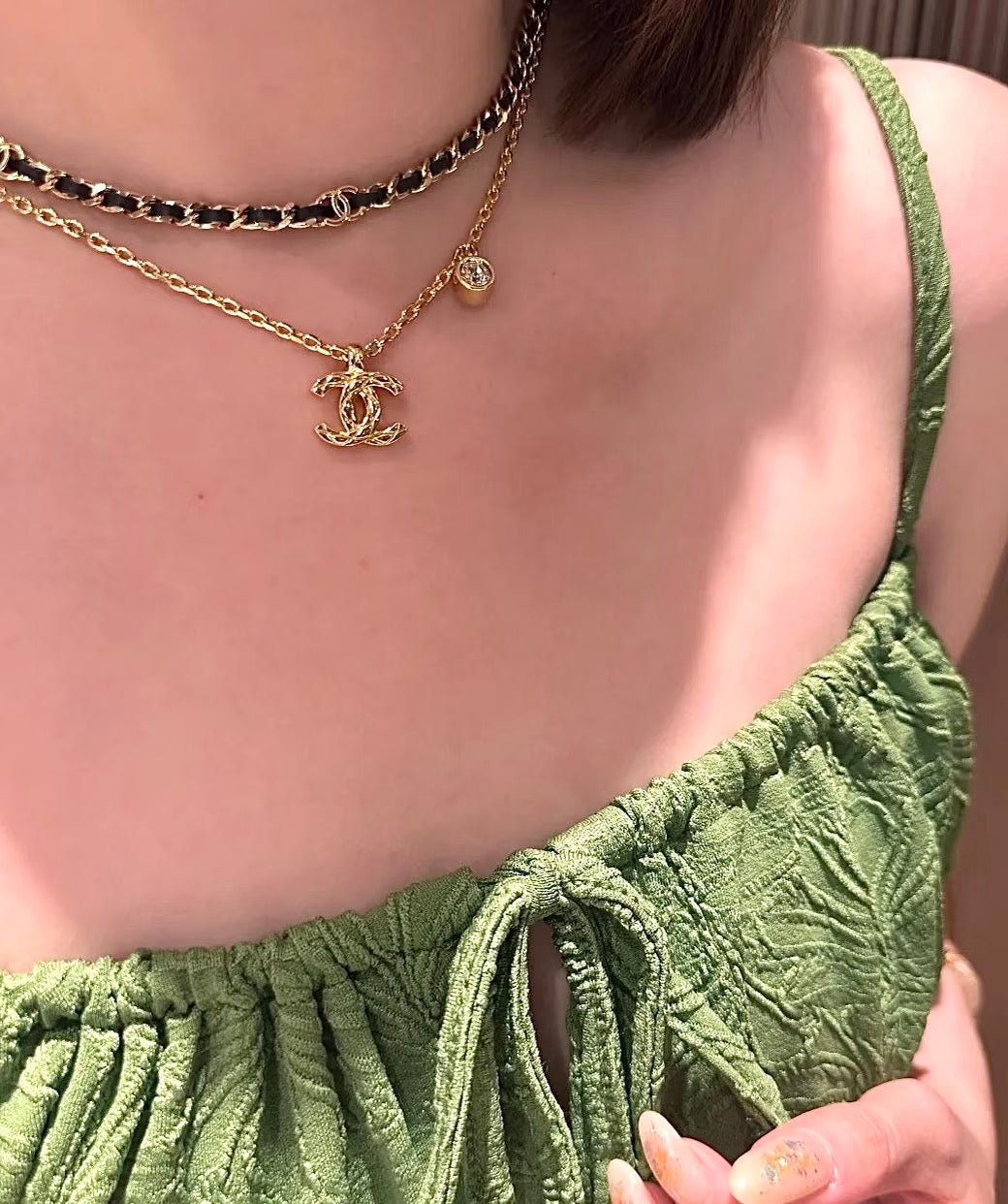 Martin Graham pendant necklace in polished metal-tone – detail view