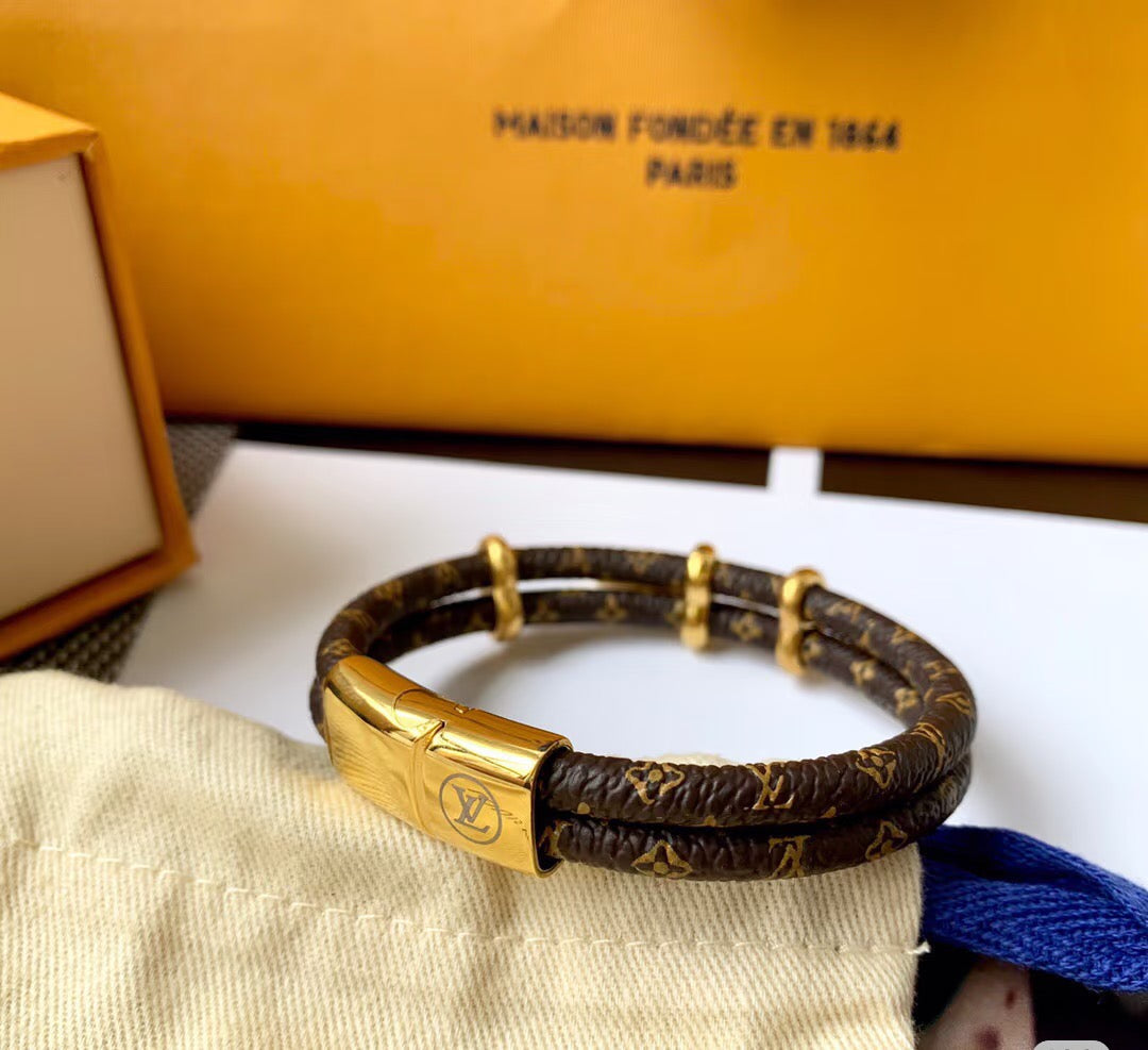 Martin Graham bangle in polished metal-tone – styled product view