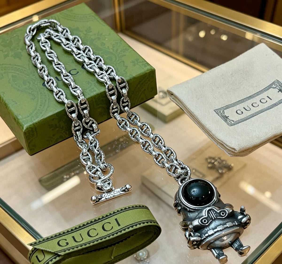 Martin Graham pendant necklace in polished metal-tone – styled product view