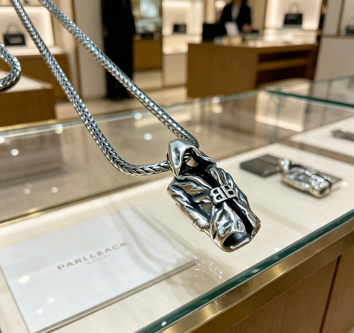 Martin Graham pendant necklace in polished metal-tone – front product view