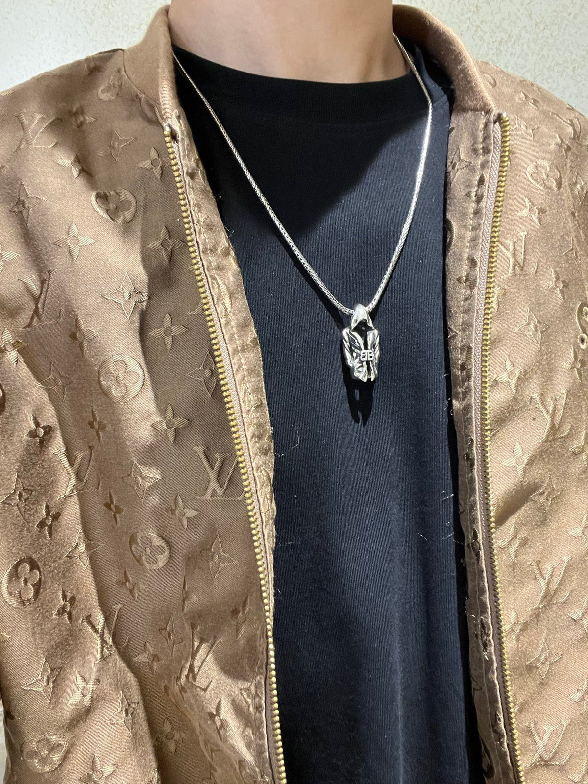 Martin Graham pendant necklace in polished metal-tone – close-up detail