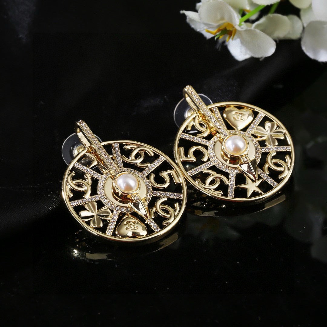 Martin Graham earrings in polished metal-tone – main product view