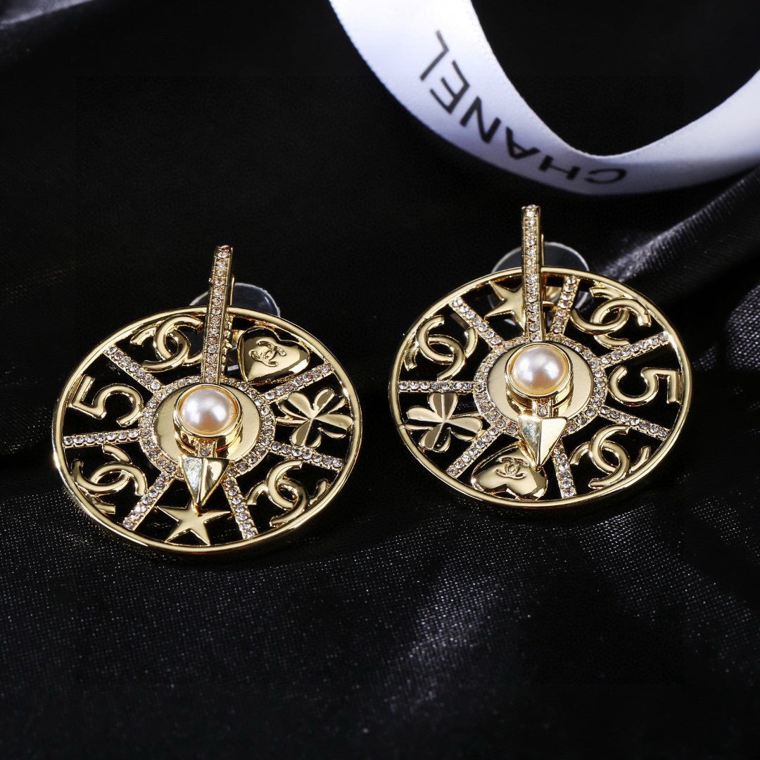 Martin Graham earrings in polished metal-tone – side detail