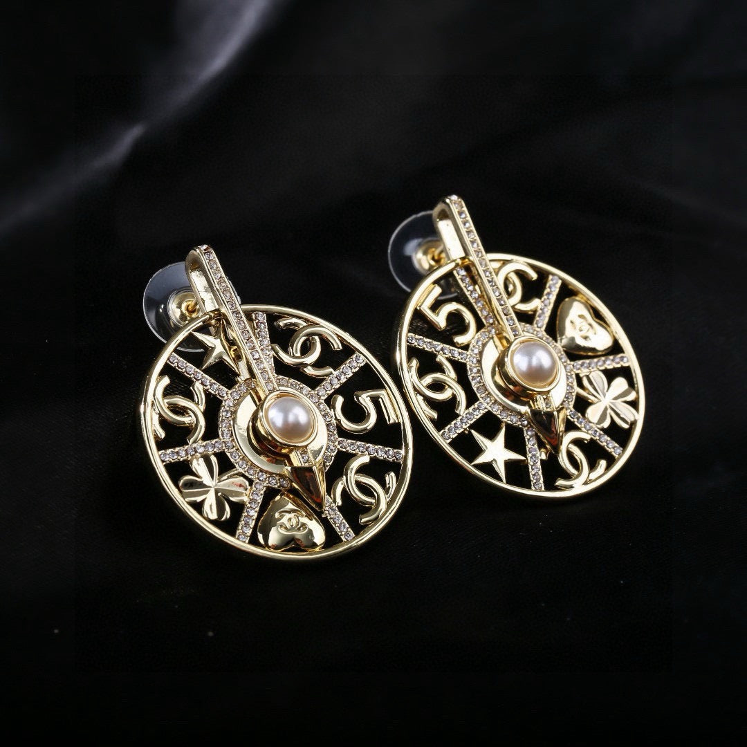 Martin Graham earrings in polished metal-tone – styled product view