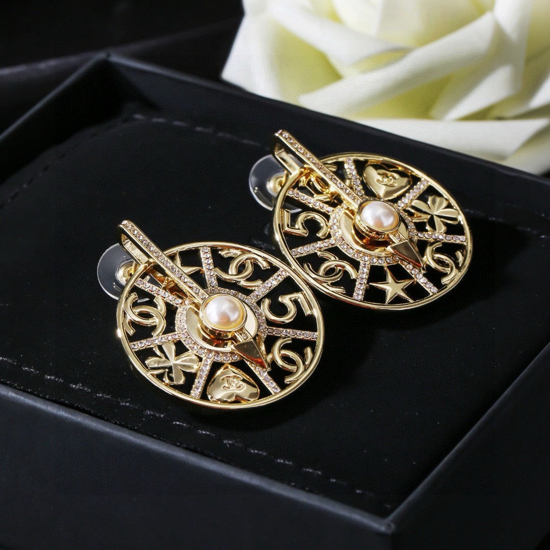 Martin Graham earrings in polished metal-tone – detail view