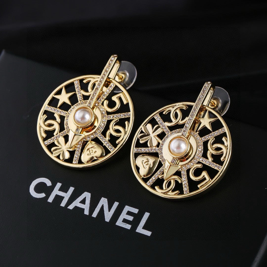 Martin Graham earrings in polished metal-tone – main product view