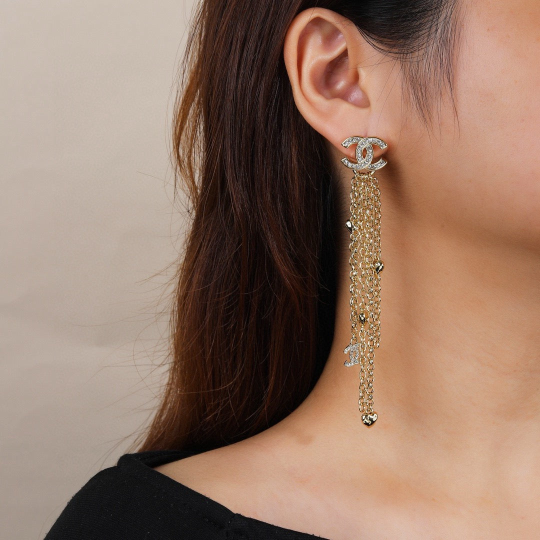 Martin Graham earrings in polished metal-tone – front product view