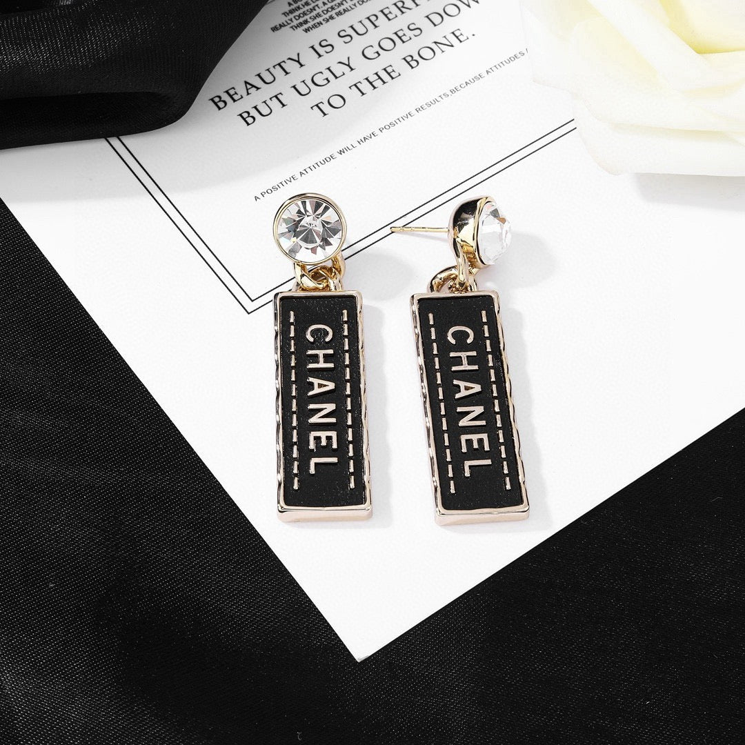 Martin Graham earrings in polished metal-tone – front product view
