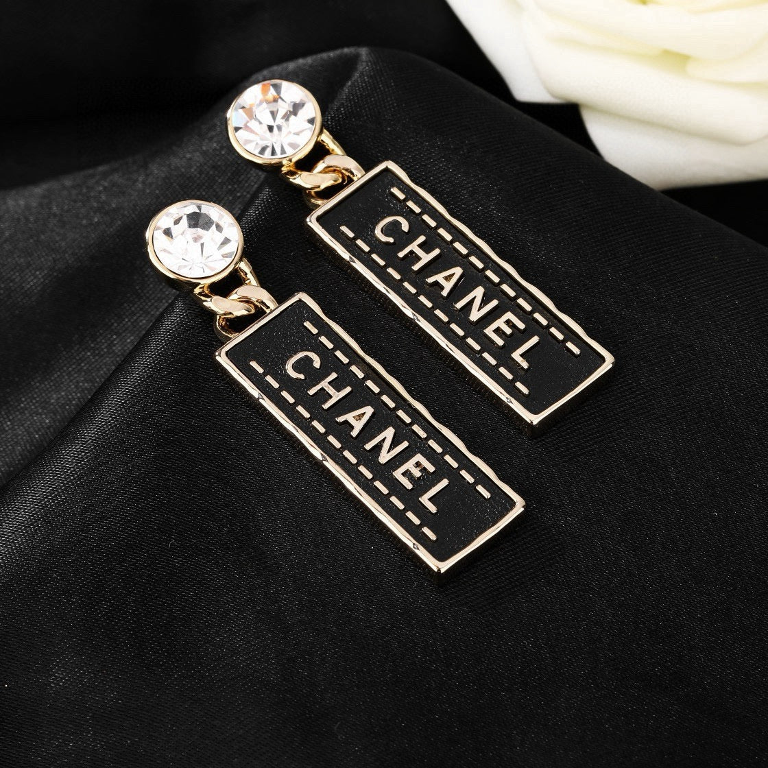 Martin Graham earrings in polished metal-tone – detail view