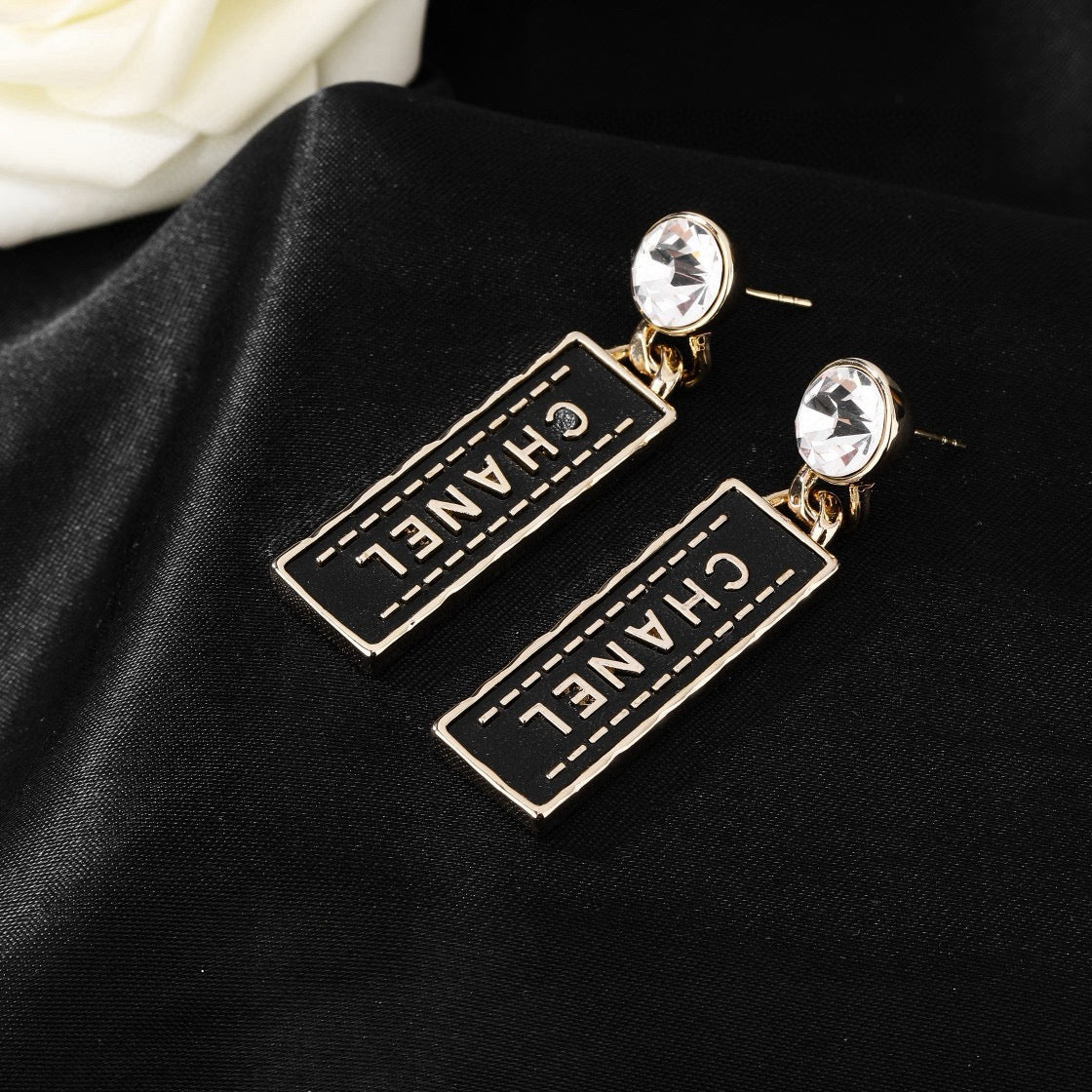 Martin Graham earrings in polished metal-tone – side detail