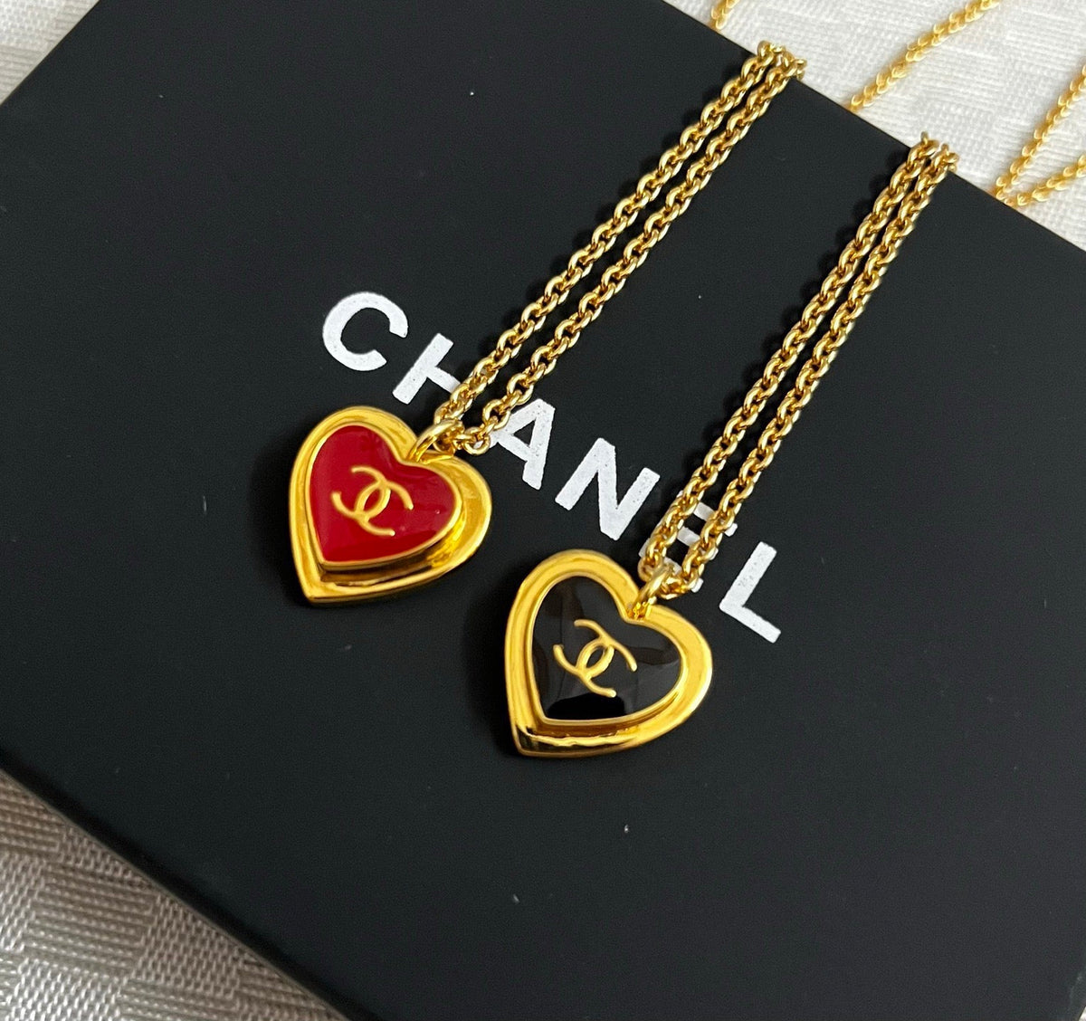 Martin Graham pendant necklace in polished metal-tone – close-up detail