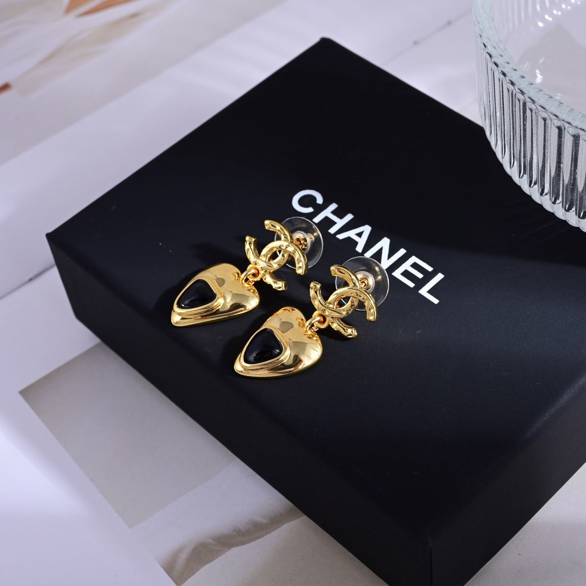 Martin Graham stud earrings in polished metal-tone – main product view